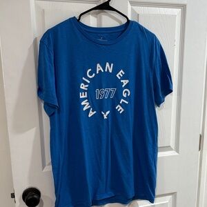 American Eagle Outfitters 1977 Blue Tee